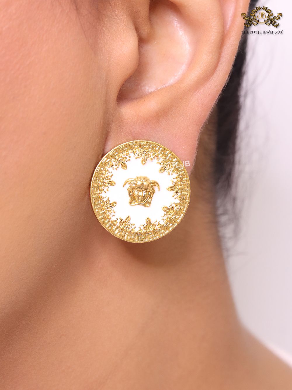 Medusa gold and white studs