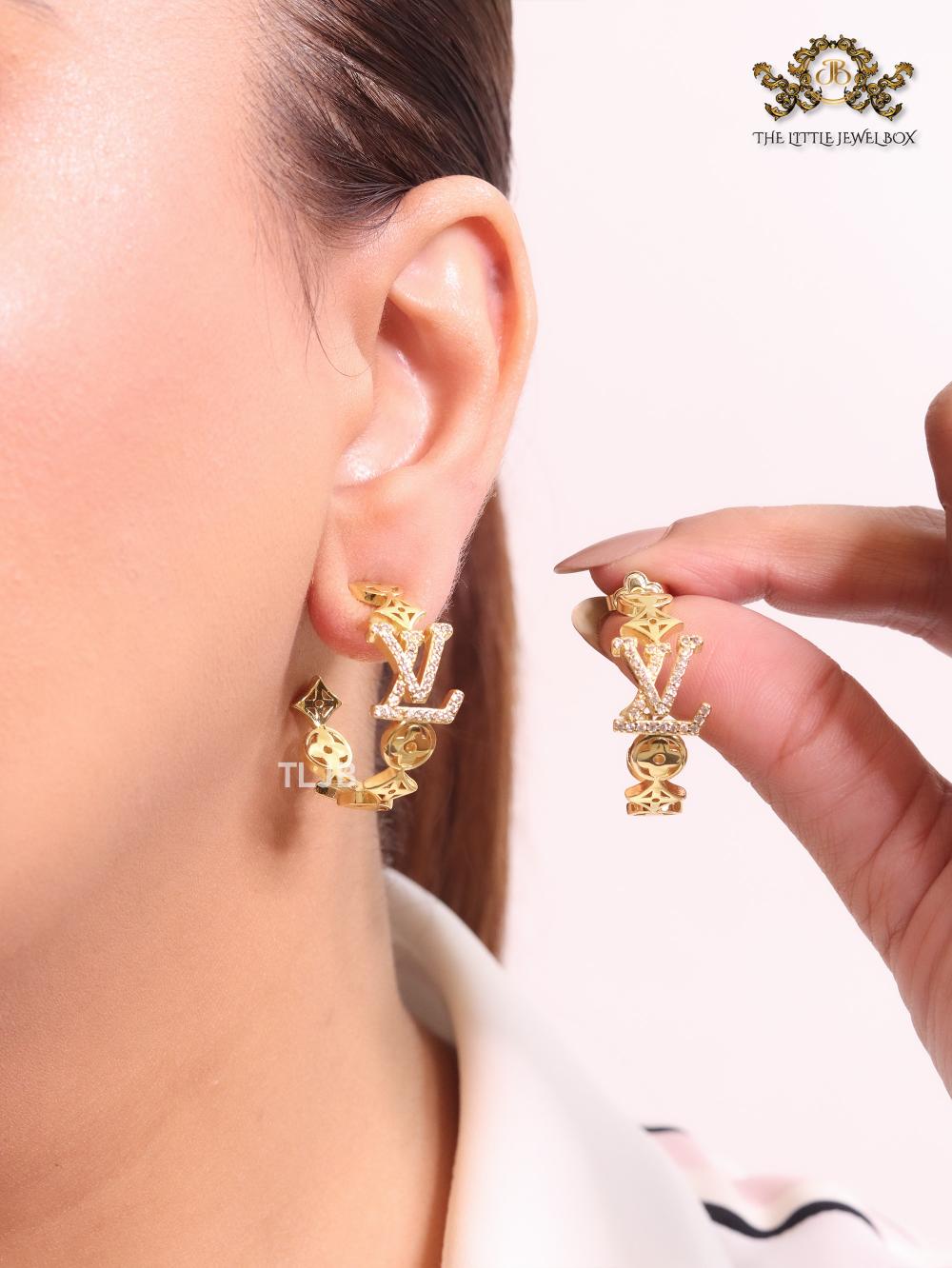 Alphabet L & V gold and cz statement hoops