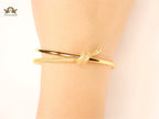 Alphabet T& Co knot bracelet in gold
