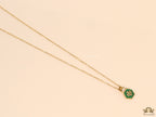 Gold plated necklace with malachite green T motif pendant