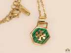 Gold plated necklace with malachite green T motif pendant