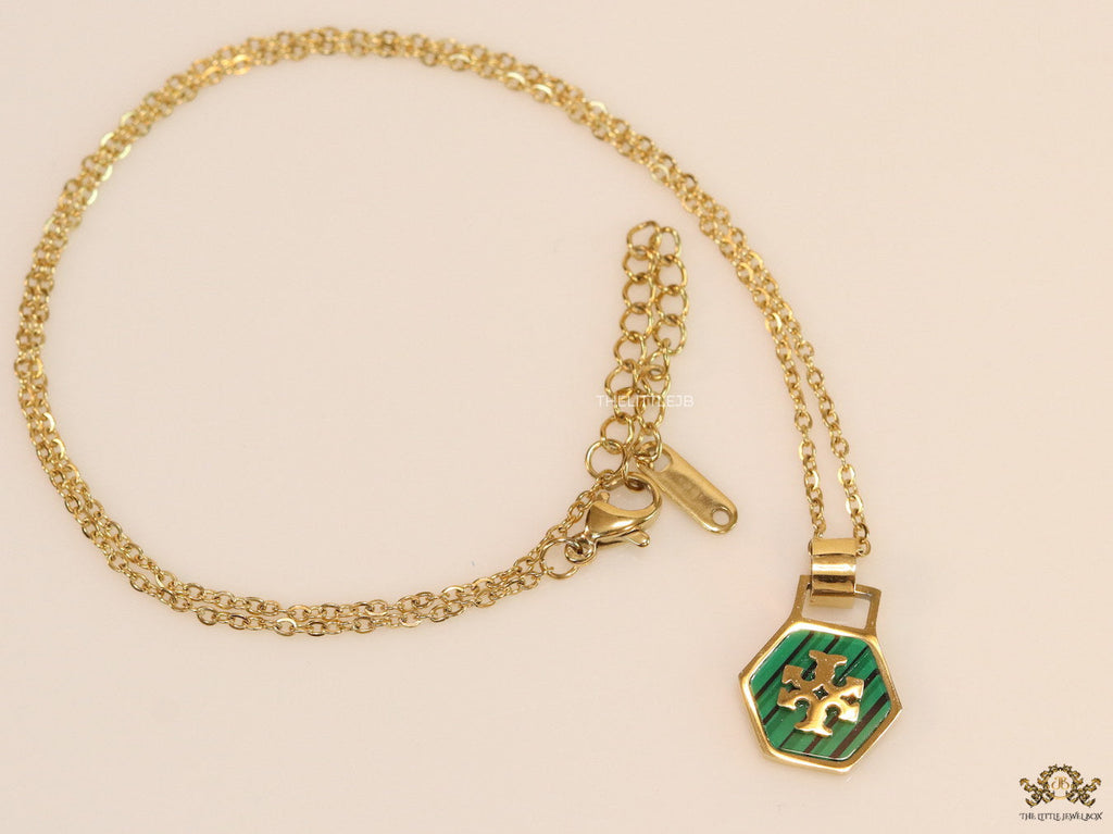 Gold plated necklace with malachite green T motif pendant