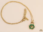 Gold plated necklace with malachite green T motif pendant