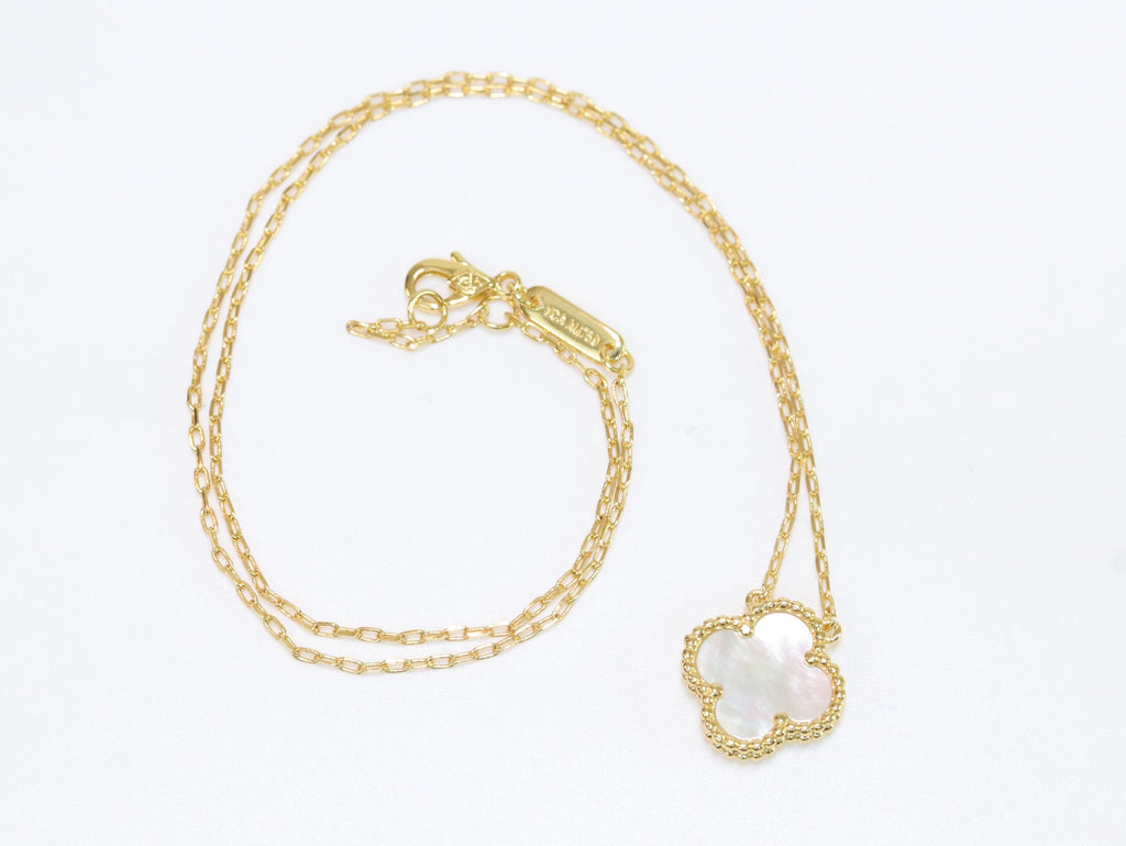 Sleek gold pearl white clover chain