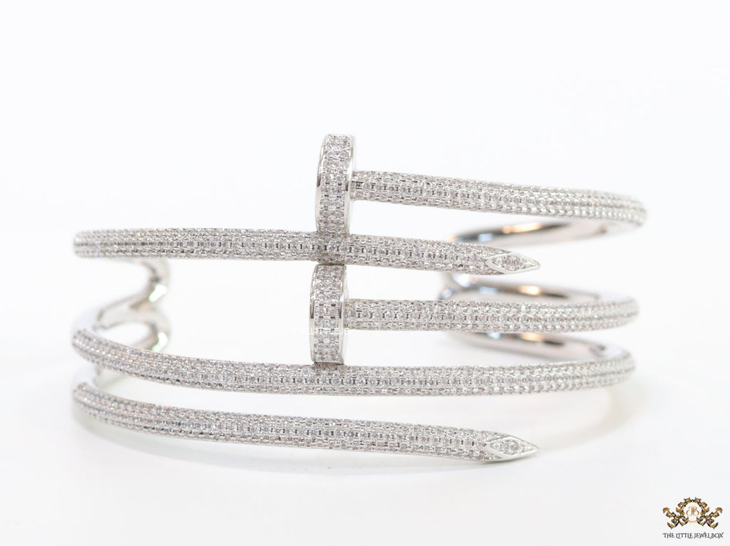 Platinum plated twin nail bracelet with cz