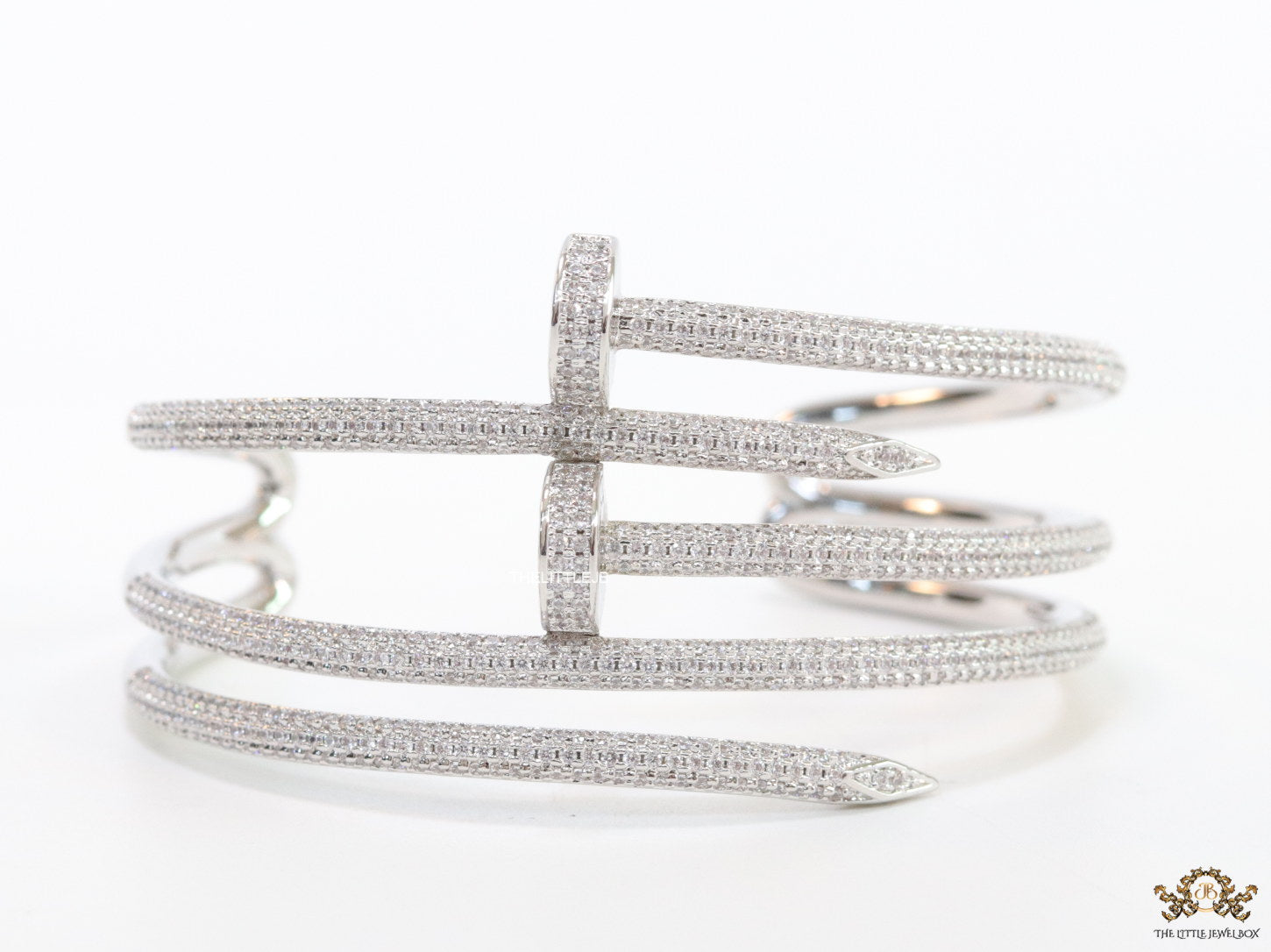 Platinum plated twin nail bracelet with cz