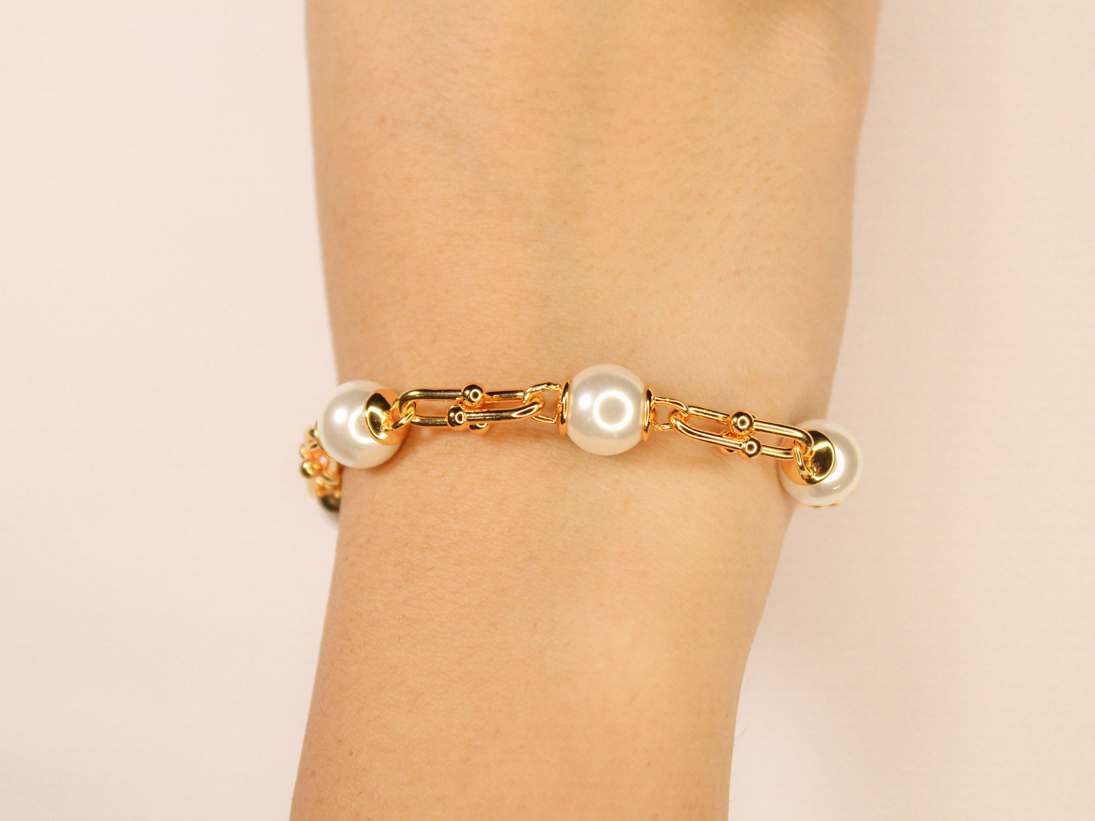 Gold and pearl Tiff & Co linked chain bracelet