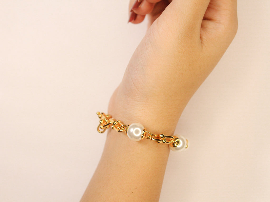 Gold and pearl Tiff & Co linked chain bracelet