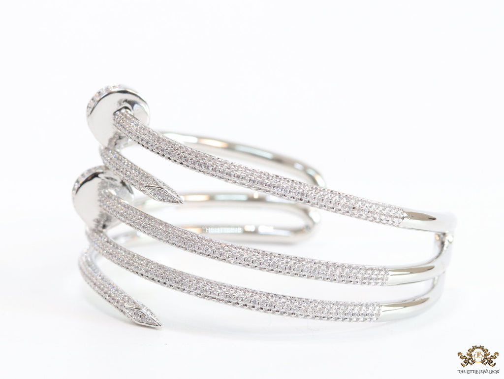Platinum plated twin nail bracelet with cz