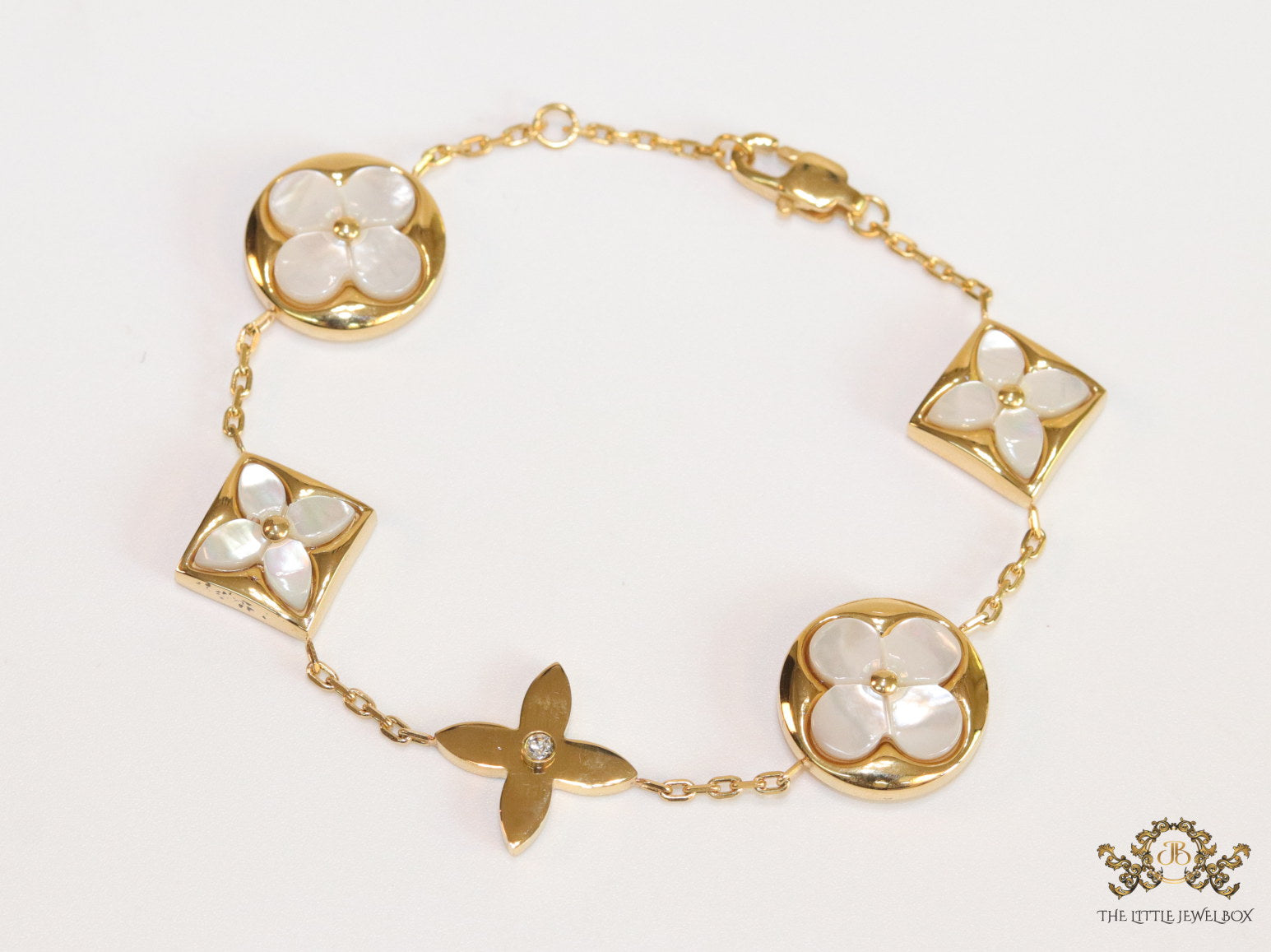 Gold plated chain bracelet with MOP clovers XL