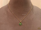 Gold plated necklace with malachite green T motif pendant