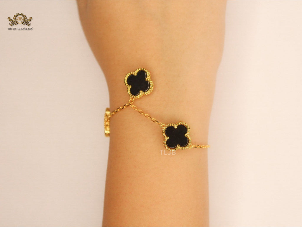 Gold Clover charms bracelet in Black