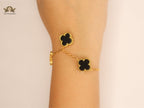 Gold Clover charms bracelet in Black