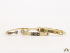 Multilayered golden alphabet bracelet with cz
