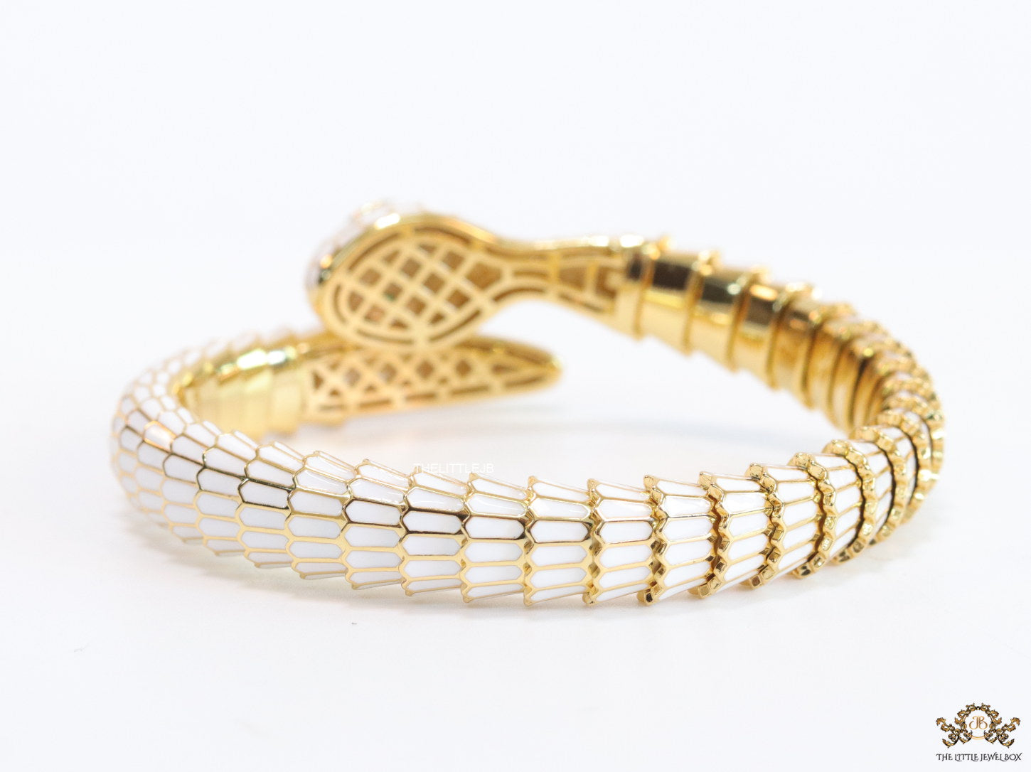 Serpentine open bracelet in white enamel and golden finish