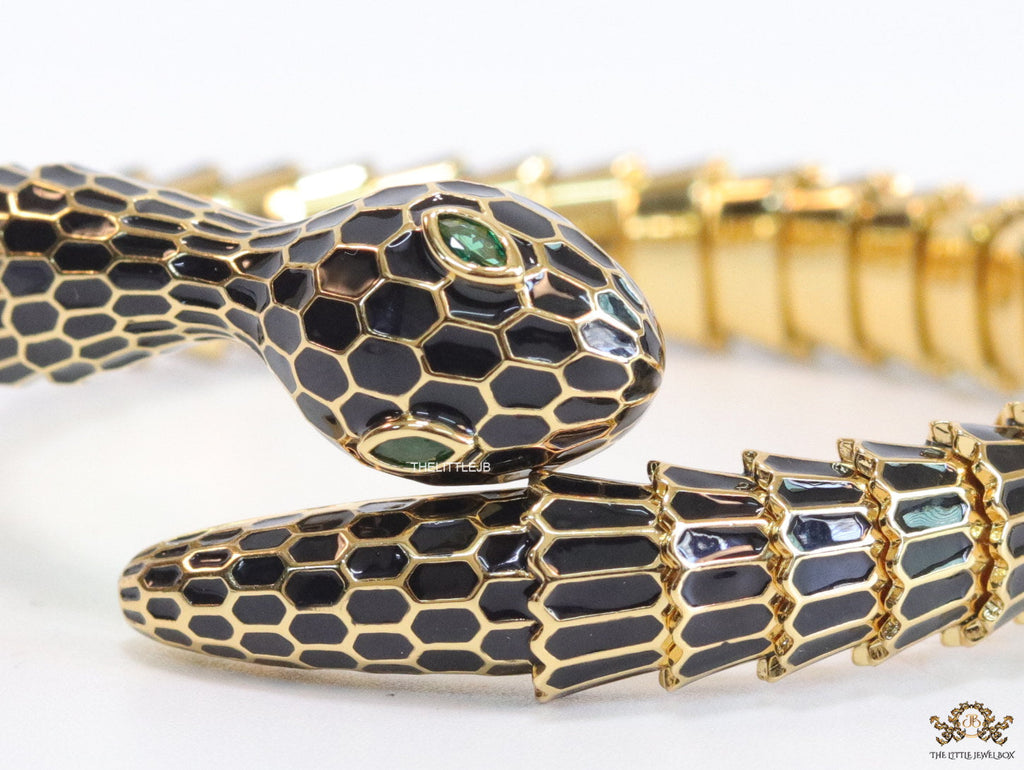 snake open bracelet in black and golden finish
