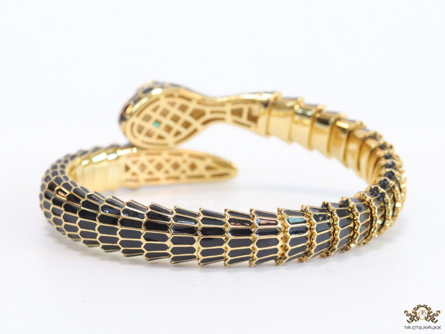 snake open bracelet in black and golden finish