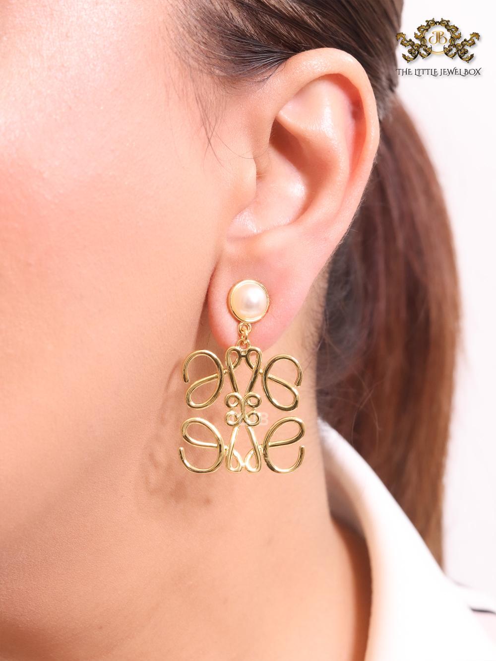Alphabet L pearl and gold danglers