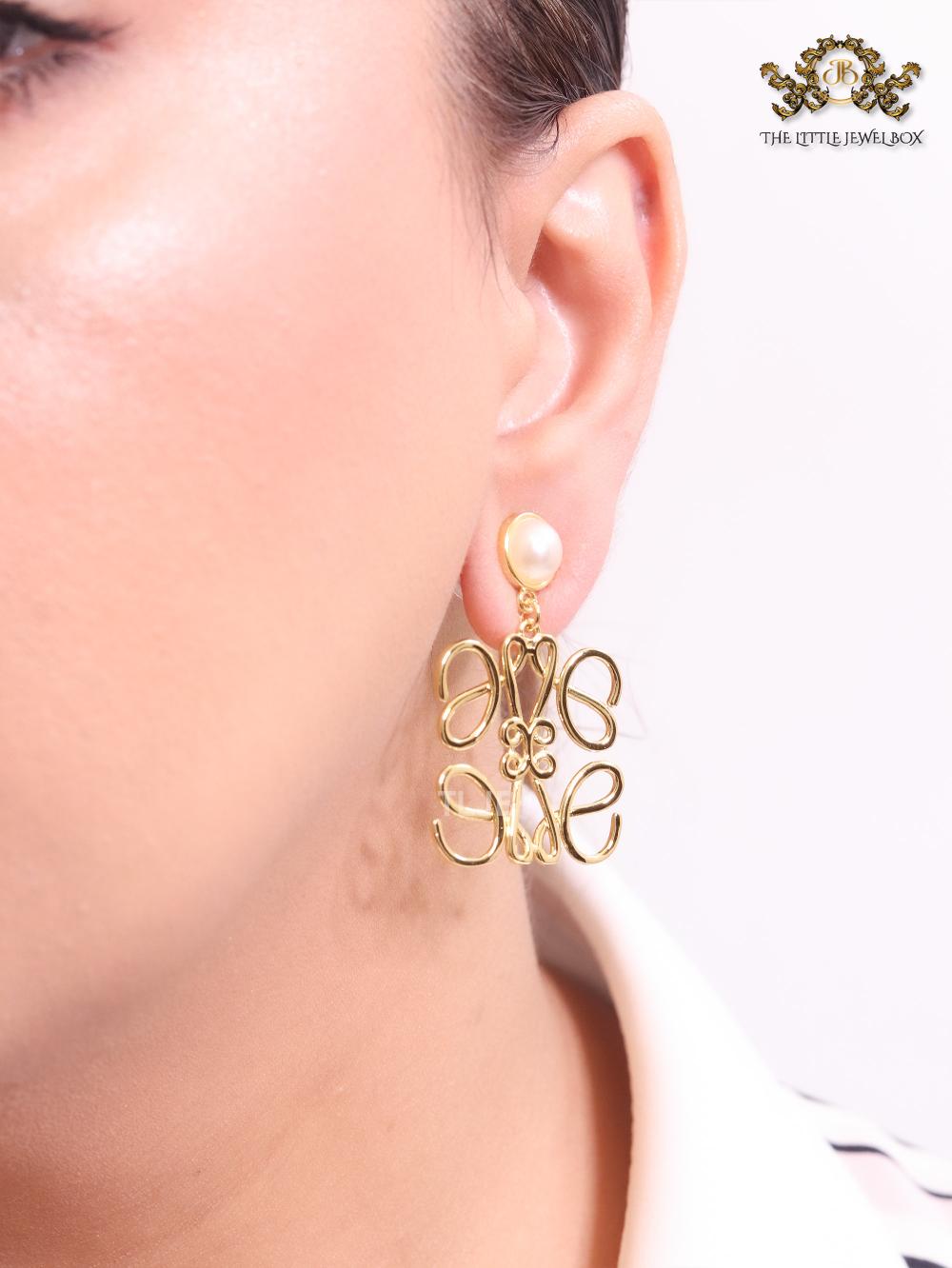 Alphabet L pearl and gold danglers