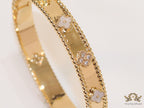 Gold plated bracelet with clover motifs in cz and MOP