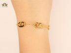 Alphabet V Gold bracelet with CZ