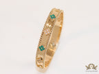 Gold plated bracelet with clover motifs in cz and malachite green