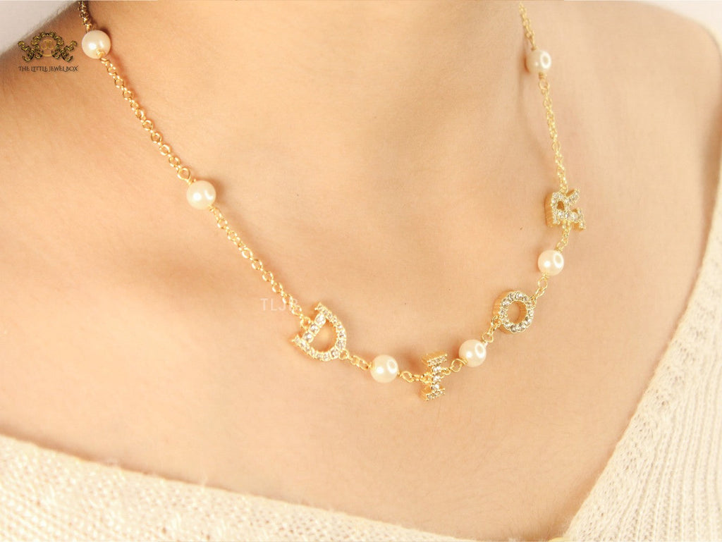 alphabet D golden charm necklace with CZ