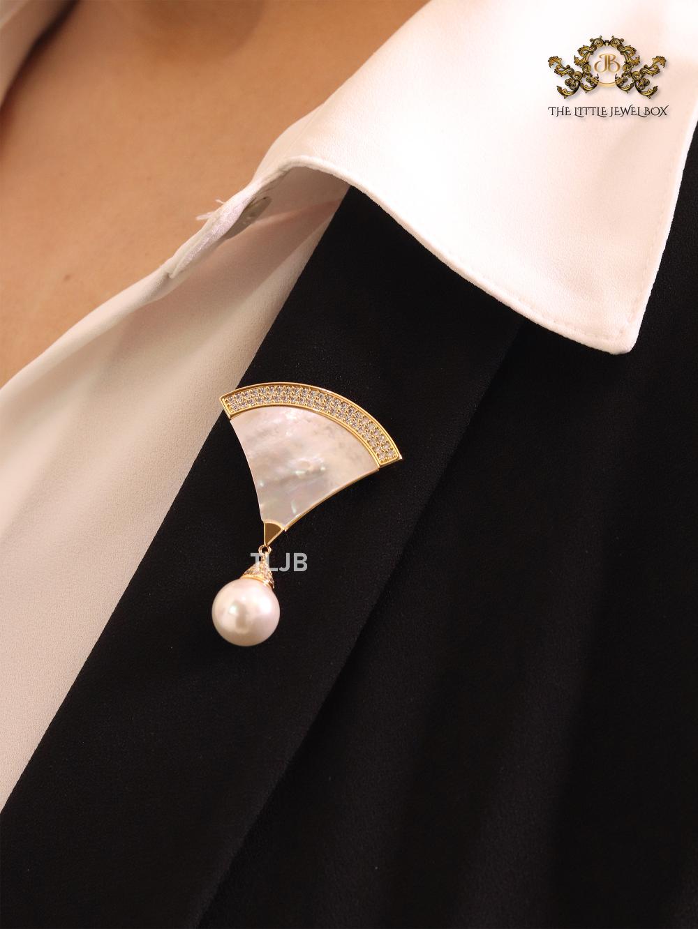 White enamel brooch with pearl