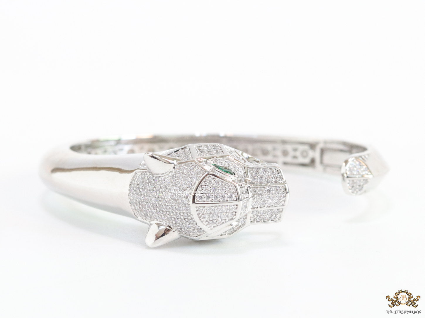 Platinum plated open panther bracelet with cz