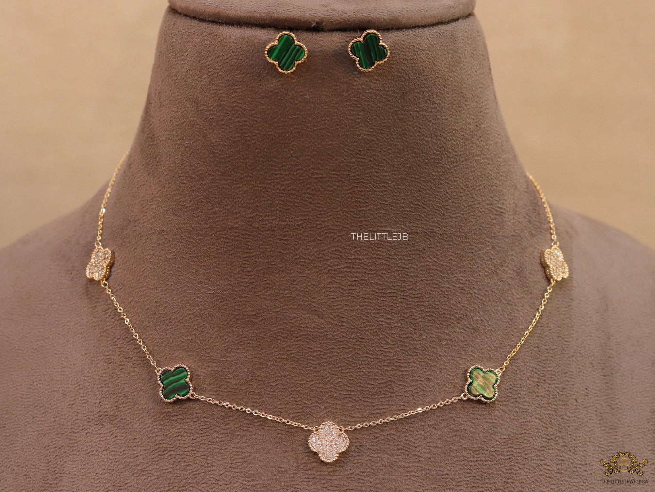 Gold plated necklace set with cz and malachite green clovers