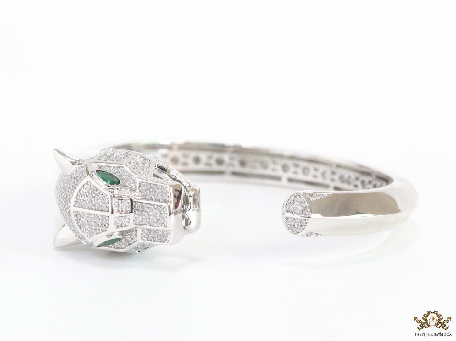 Platinum plated open panther bracelet with cz