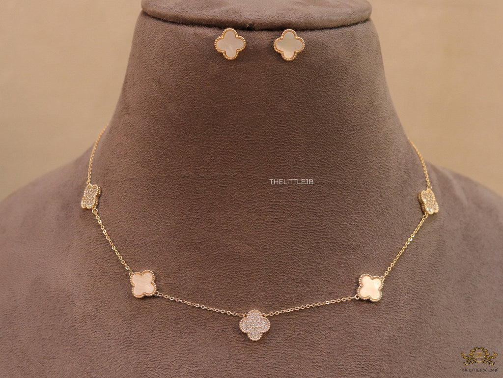 Gold plated necklace set with cz and mother of pearl clovers
