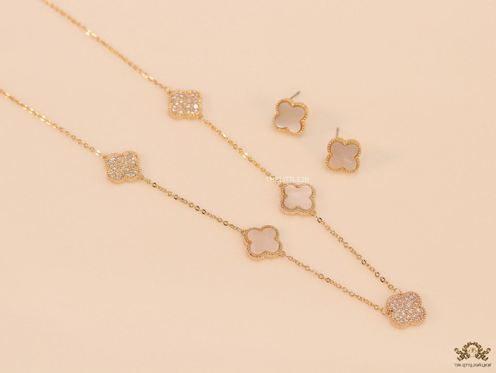 Gold plated necklace set with cz and mother of pearl clovers