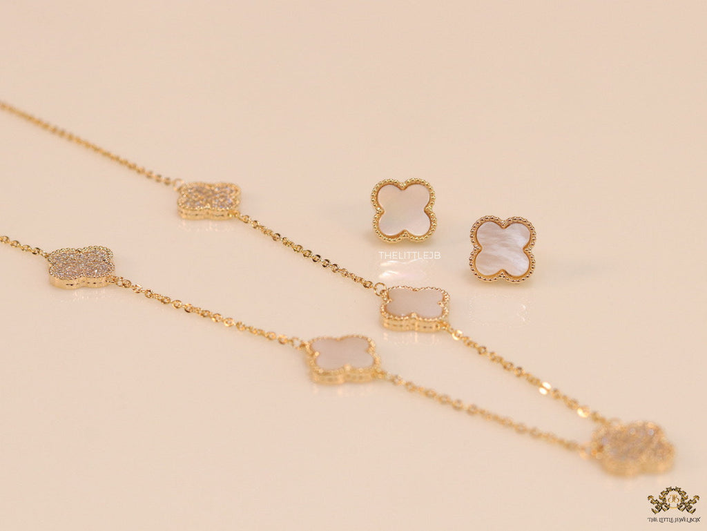 Gold plated necklace set with cz and mother of pearl clovers