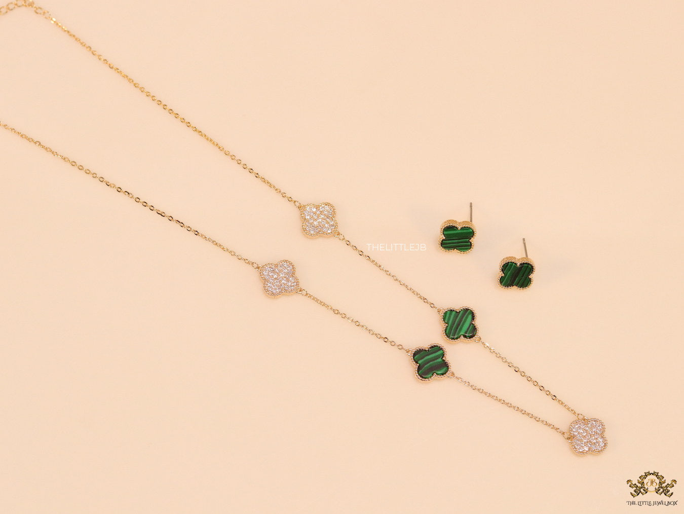 Gold plated necklace set with cz and malachite green clovers