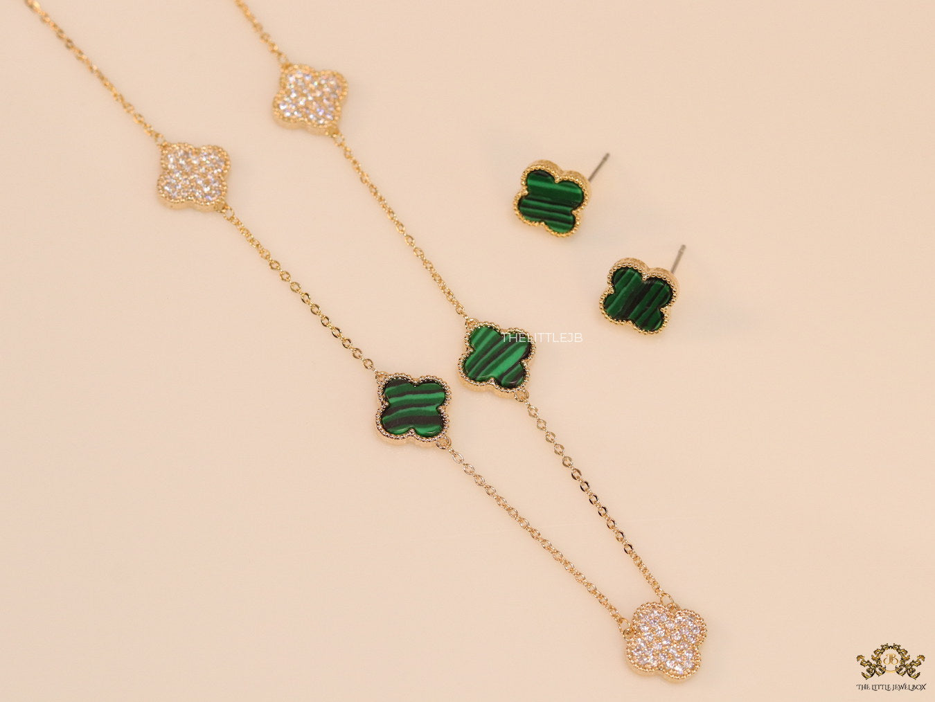 Gold plated necklace set with cz and malachite green clovers