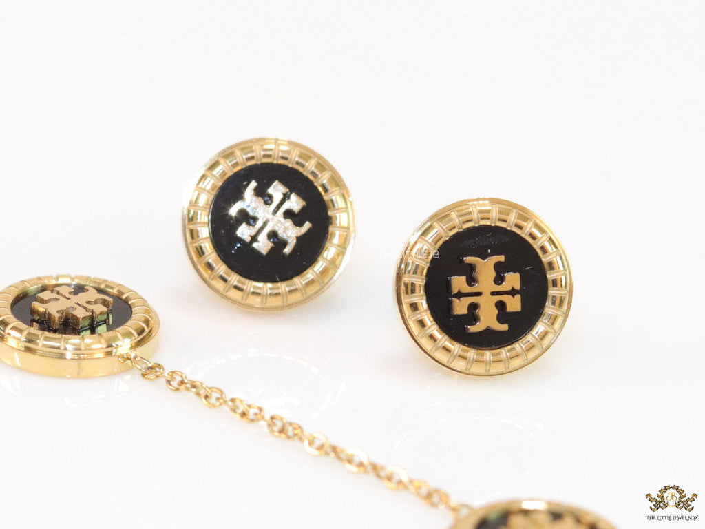 Gold plated necklace set with T motif black enamel coated discs