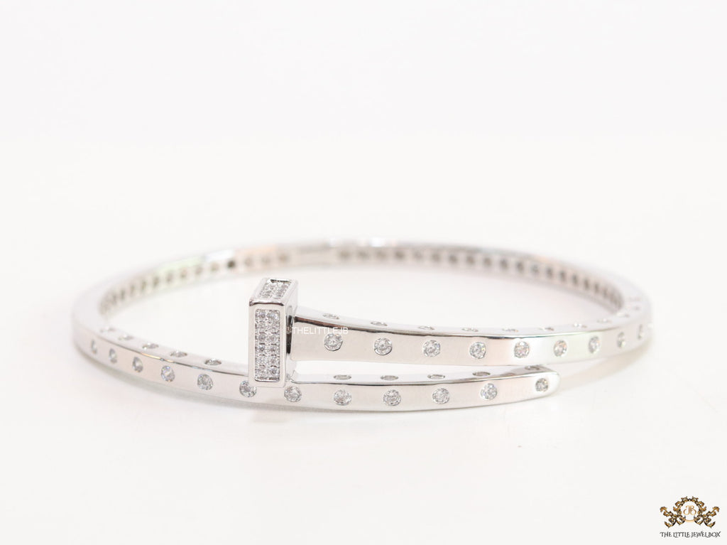 Platinum plated cz bracelet with cz head