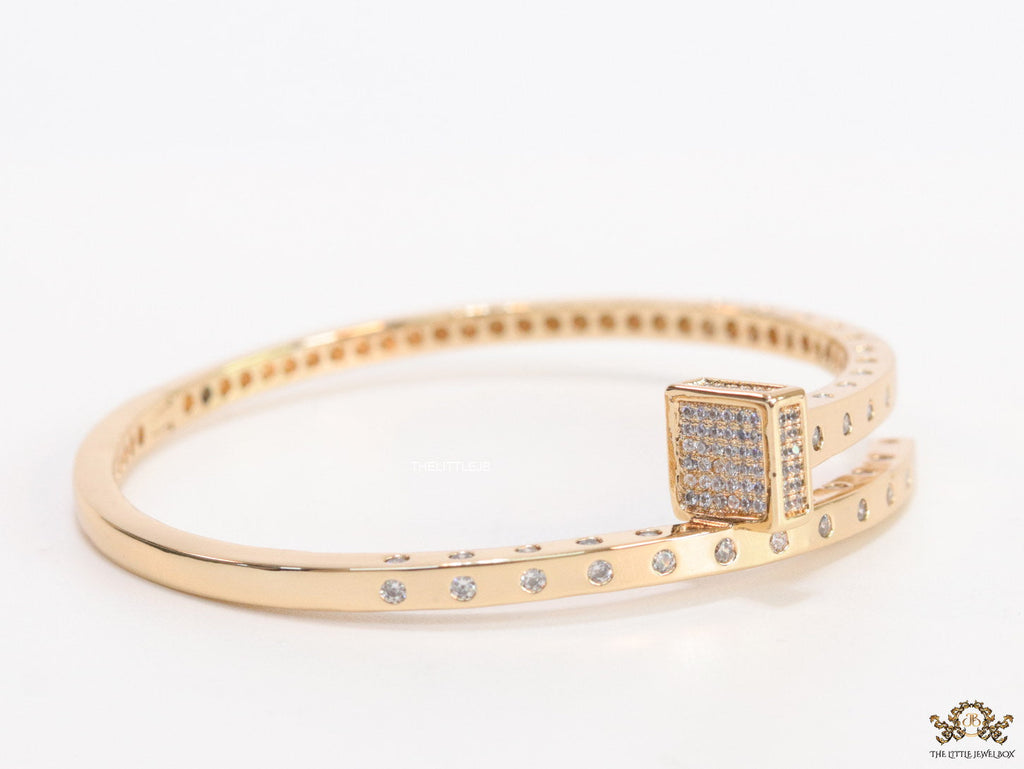 Golden cz bracelet with cz head