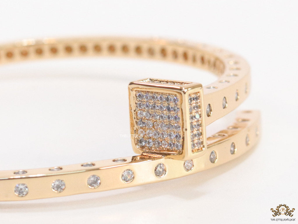Golden cz bracelet with cz head