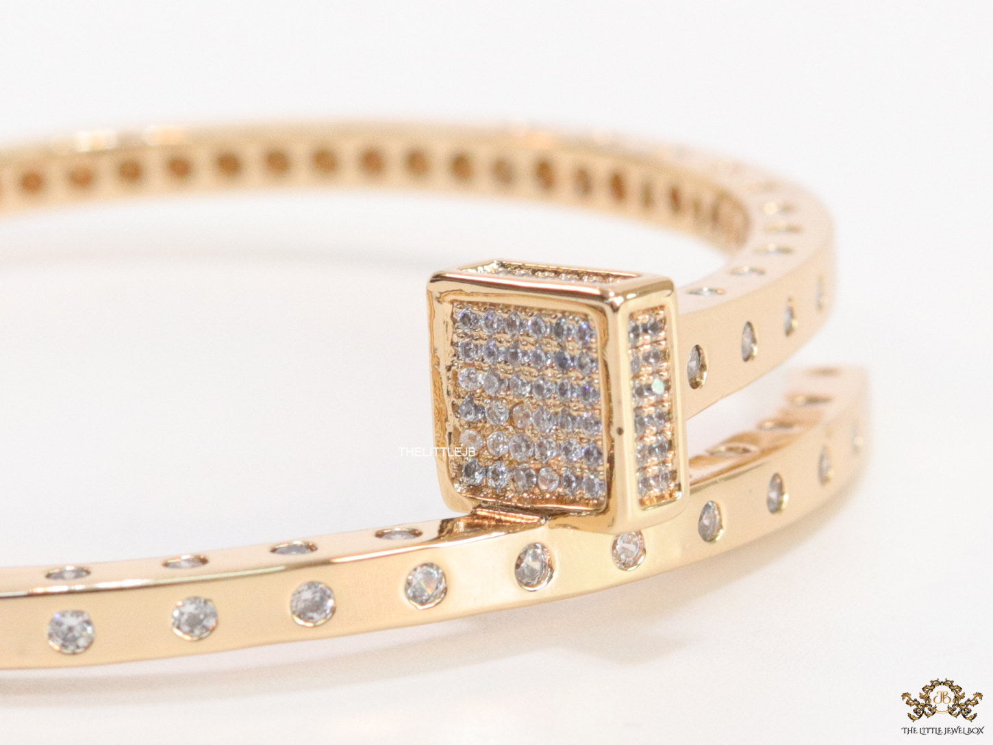 Golden cz bracelet with cz head