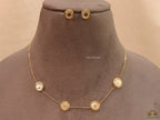Gold plated necklace set with T motif mother of pearl discs