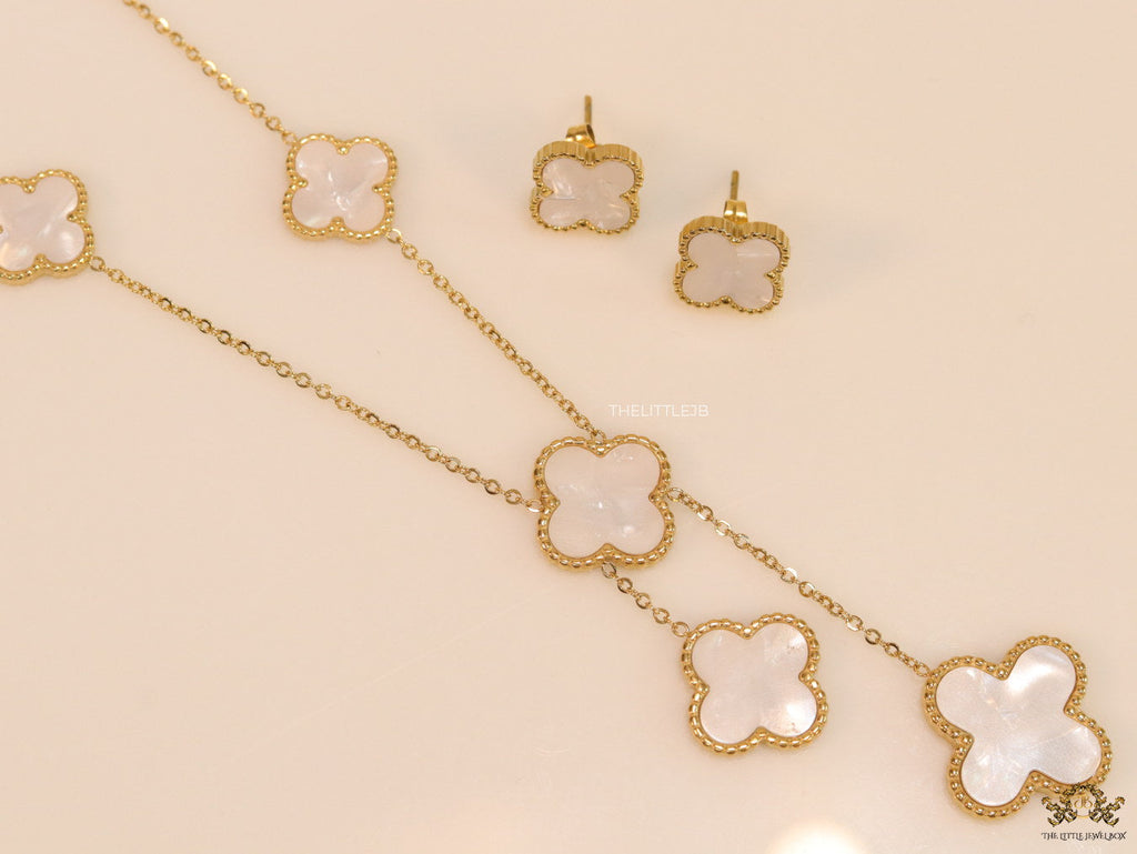 Gold plated necklace set with mother of pearl clovers