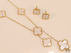 Gold plated necklace set with mother of pearl clovers