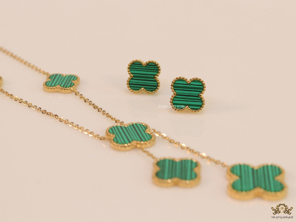 Gold plated necklace set with malachite green clovers