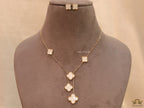 Gold plated necklace set with mother of pearl clovers
