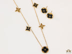 Clover necklace set in black enamel and gold plating