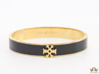 Golden and black bracelet with T motif