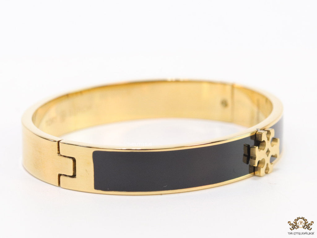 Golden and black bracelet with T motif