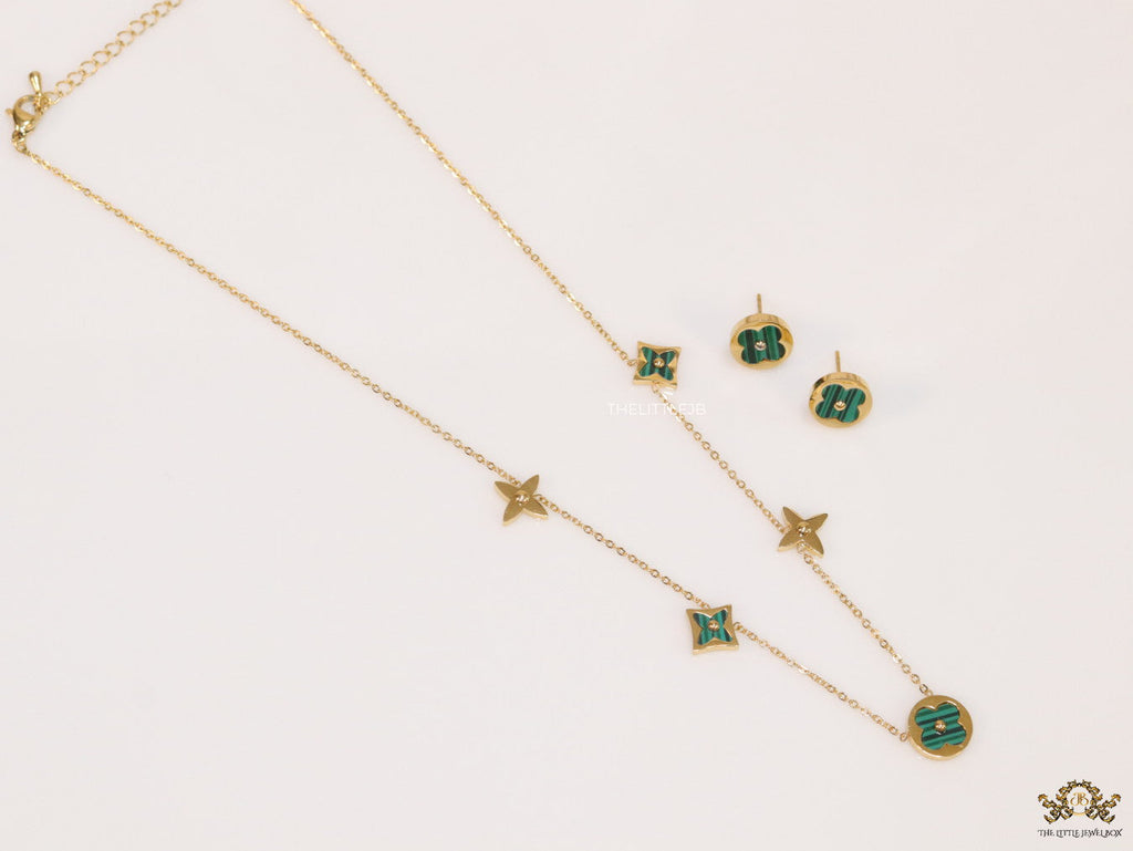 Clover necklace set in green malachite and gold plating